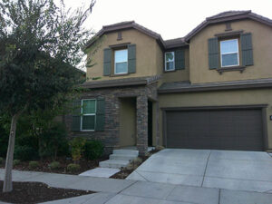 the front of Randell and Heather's home looks warm and inviting