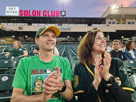 Randell and Heather enjoying a baseball game together