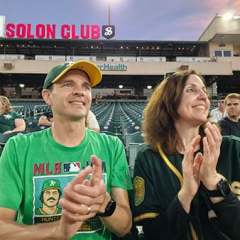 Randell-and-Heather-applauding-at-baseball-game